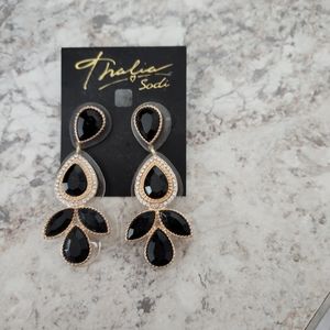 Black and gold earnings